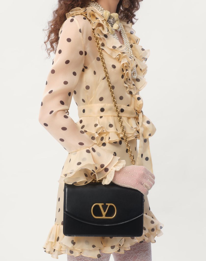 Valentino Handbags Abito Corto In Organza Stampa Pois Spots per Donna in Avorio/nero | Valentino IT Negozi Online