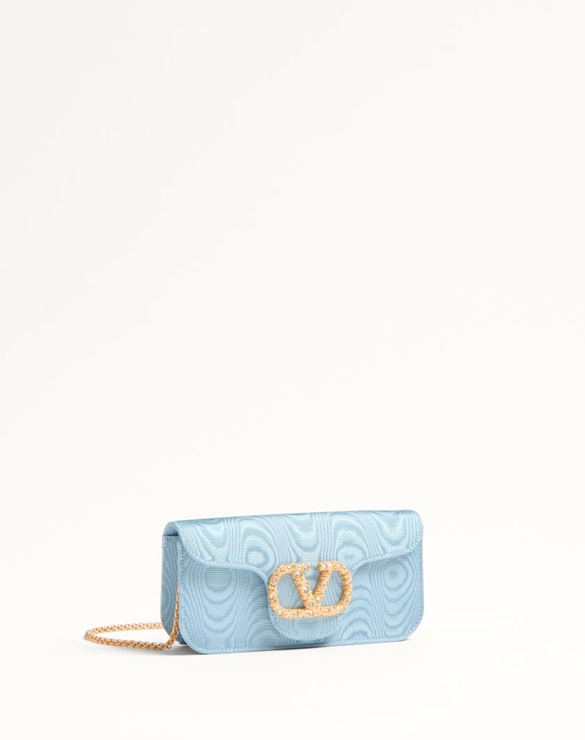 Valentino Handbags Clutch Valentino Garavani Locò In Tessuto Moiré Con Logo Gioiello per Donna in Nero/crystal | Valentino IT 2025