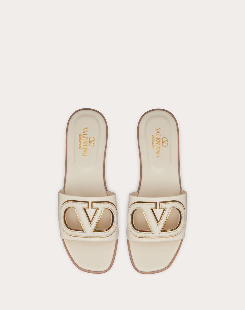 Valentino Handbags Sandalo Slide Vlogo Cut-out In Vitello per Donna in Avorio/antique Brass | Valentino IT Fino al 50% di sconto